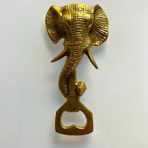 Vintage elephant bottle opener. Gold metal.